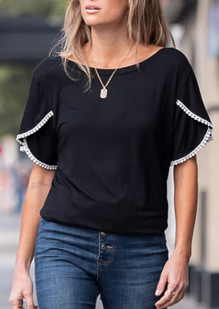 

Blouses Pom Pom Irregular Blouse in Black. Size