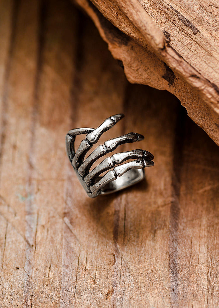 

Earrings Skeleton Hand One Piece Earring in Silver. Size
