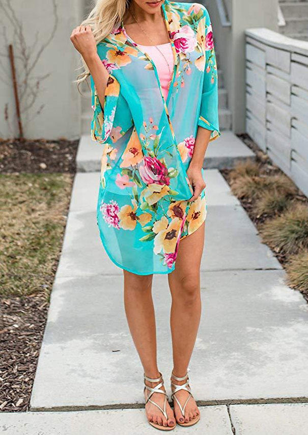 

Cardigans Floral Three Quarter Sleeve Cardigan in Lake Blue. Size
