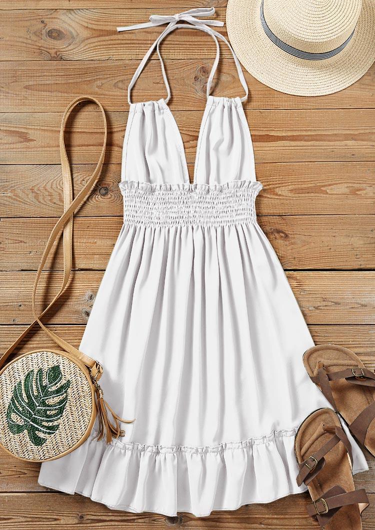 

Mini Dresses Open Back Ruffled Smocked Waist Halter Mini Dress - Beige in Apricot. Size