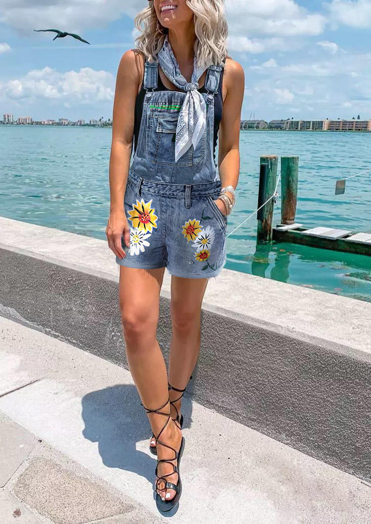 

Jumpsuits & Rompers Floral Pocket Overall Denim Romper in Blue. Size: ,M,L,XL