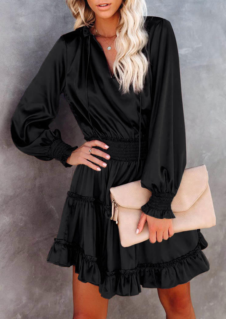 

Mini Dresses Ruffled Smocked Long Sleeve Mini Dress in Black. Size