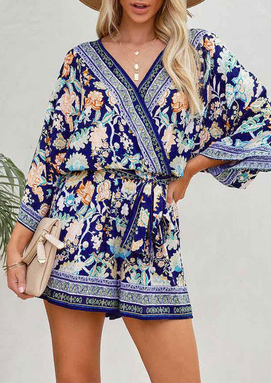 

Jumpsuits & Rompers Floral Wrap Tie V-Neck Romper in Multicolor. Size