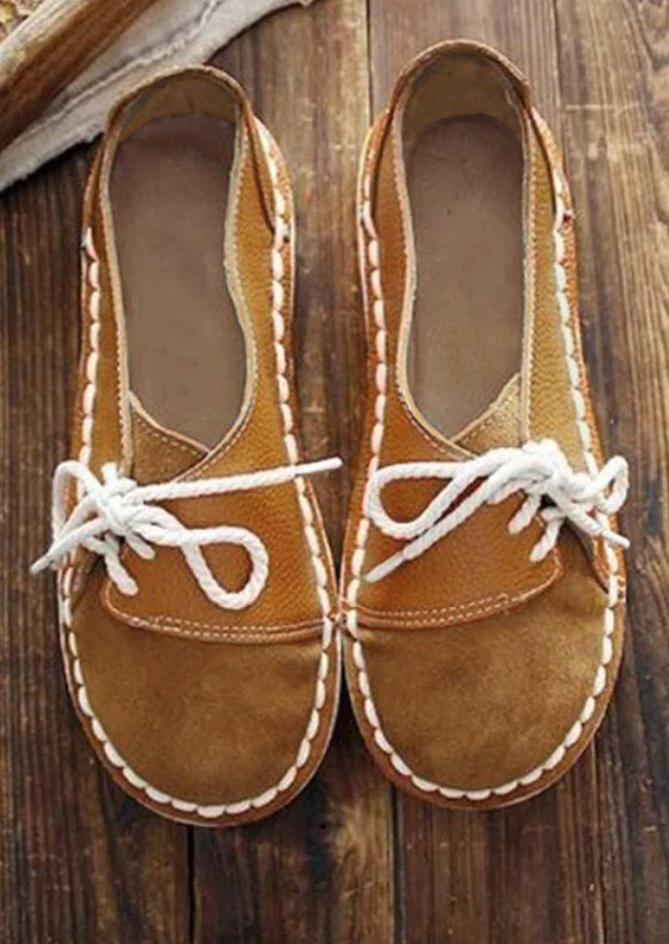 

Sneakers Lace Up Round Toe Sneakers in Brown. Size