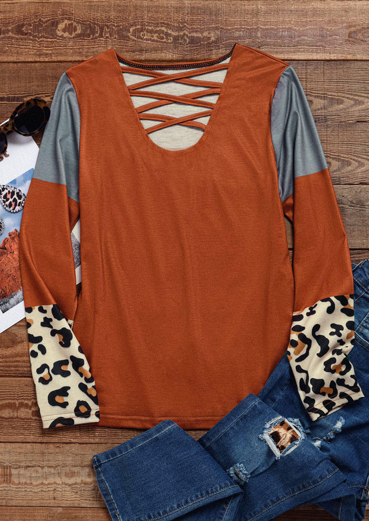 

Blouses Leopard Color Block Criss-Cross Blouse in Orange. Size