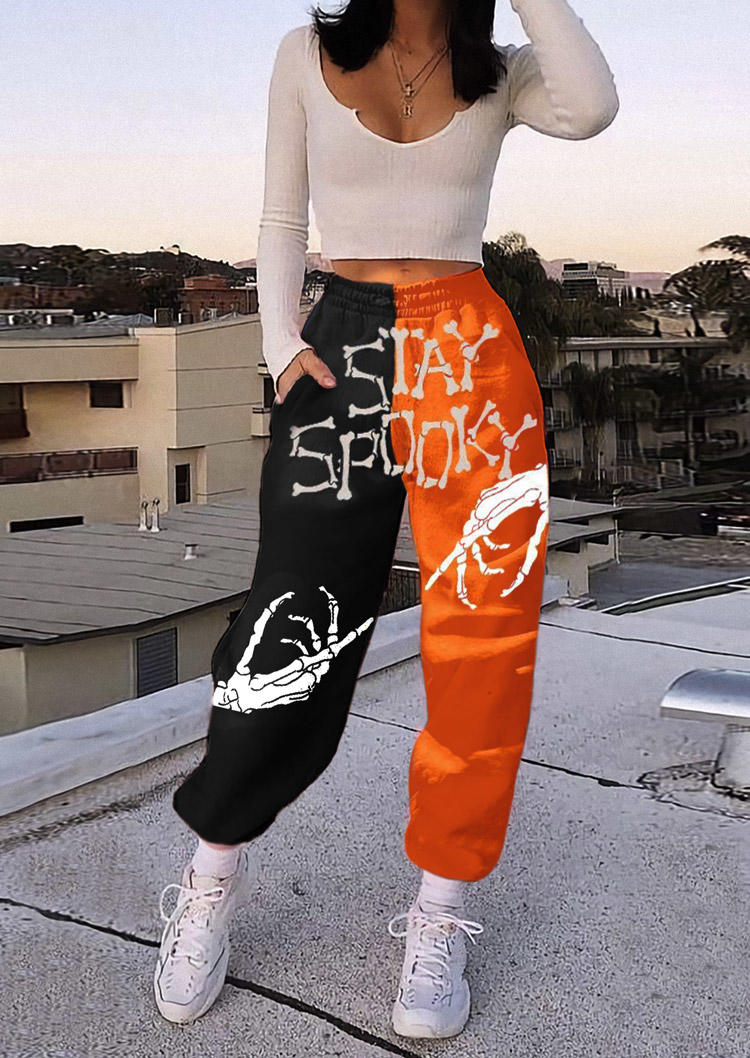 

Pants Halloween Stay Spooky Skeleton Hand Color Block Sweatpants in Multicolor. Size