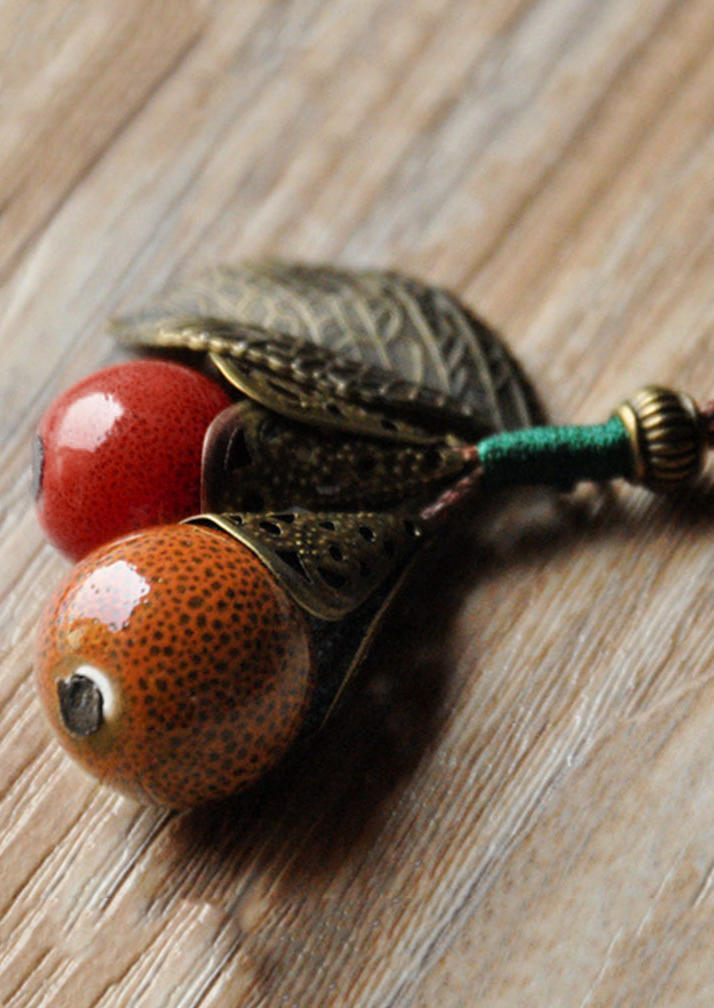 Necklaces Ceramic Ball Pendant Sweater Chain Necklace in Multicolor. Size: One Size