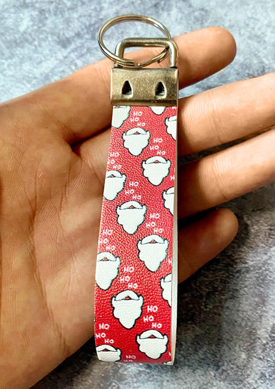 

Keychains Christmas Ho Ho Ho PU Leather Keychain in Red. Size