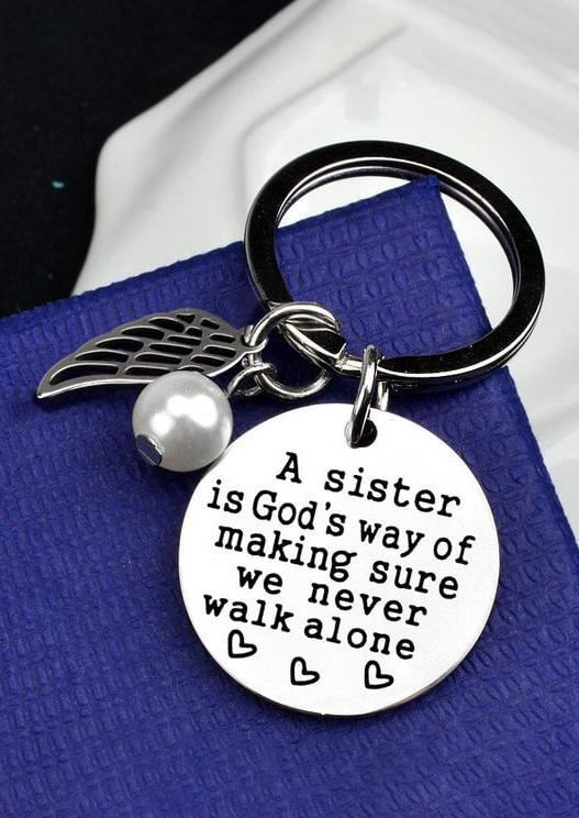 

Keychains A Sister Is God's Way Of Making Sure We Never Walk Alone Keychain in Silver. Size