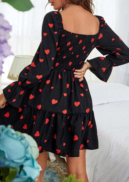 

Mini Dresses Valentine Smocked Long Sleeve Mini Dress in Black. Size: L,M,,XL