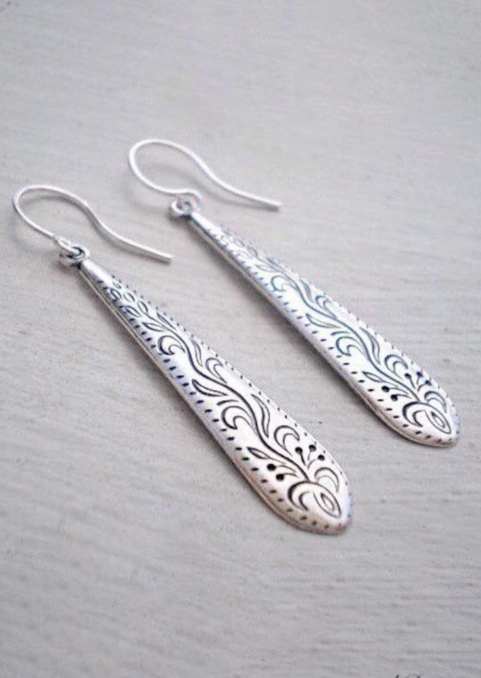 

Earrings Embossed Water Drop Earrings in Silver. Size