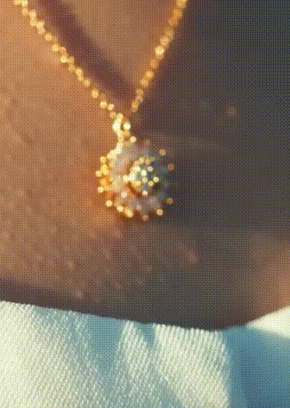

Necklaces Rhinestone Rotating Pendant Necklace in Gold. Size