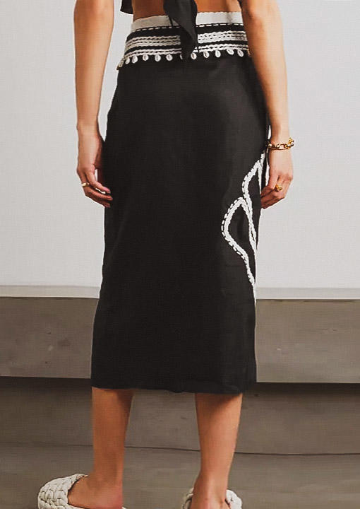 

Cover Ups Shell Cover Up Midi Wrap Skirt in Black. Size: L,M,,XL