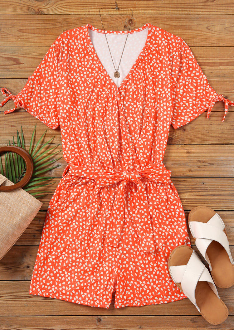 

Jumpsuits & Rompers Geometric Button Pocket V-Neck Romper with Belt in Orange. Size