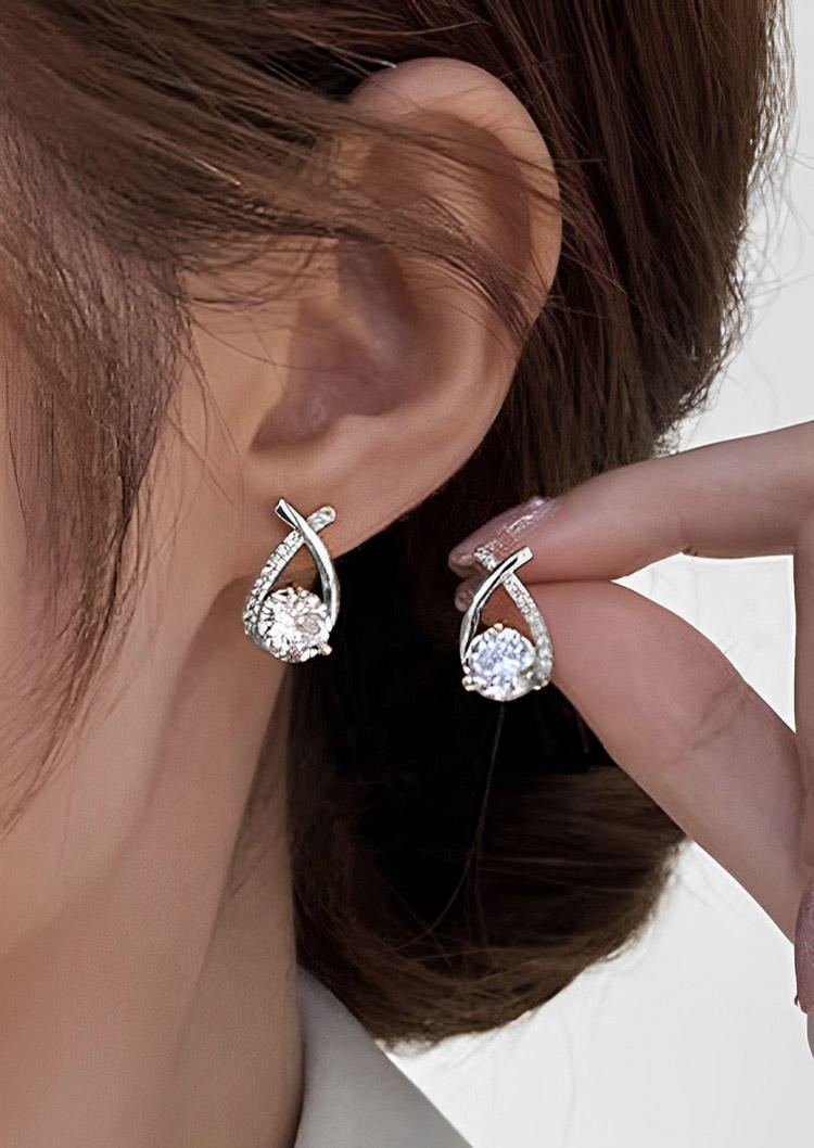 

Earrings Criss-Cross Rhinestone Stud Earrings in Silver. Size