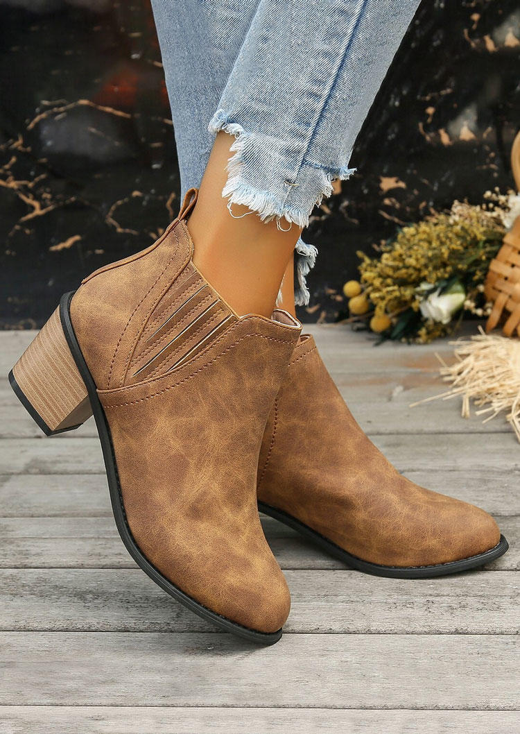 

Boots Pointed Toe Heeled Boots in Brown. Size